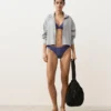 Bikiny se středním krytím a výstřihem do U s kostkovaným vzorem Bikiny se středním krytím a výstřihem do U s kostkovaným vzorem