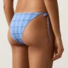 Bikiny se středním krytím a vázáním na bocích s kostkovaným potiskem Bikiny se středním krytím a vázáním na bocích s kostkovaným potiskem