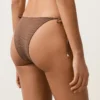 Bikiny se středním krytím a vázáním s mini puntíkovaným potiskem Bikiny se středním krytím a vázáním s mini puntíkovaným potiskem