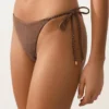 Bikiny se středním krytím a vázáním s mini puntíkovaným potiskem Bikiny se středním krytím a vázáním s mini puntíkovaným potiskem