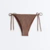 Bikiny se středním krytím a vázáním s mini puntíkovaným potiskem Bikiny se středním krytím a vázáním s mini puntíkovaným potiskem