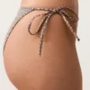 Bikiny se středním krytím, s vázáním a metalickým mini potiskem Bikiny se středním krytím, s vázáním a metalickým mini potiskem