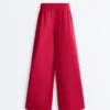 Kalhoty s širokými nohavicemi a plisováním z piké s bavlnou