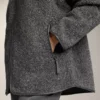 Oversize bundy z umělých kožichů s kapucí podšitou umělou kožešinou Oversize bundy z umělých kožichů s kapucí podšitou umělou kožešinou