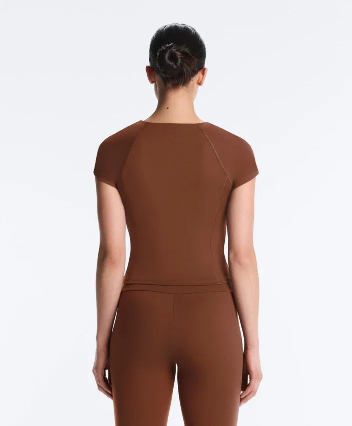 Tričko s krátkým rukávem a zipem Tričko s krátkým rukávem a zipem